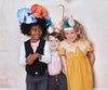 Kids wearing dinosaur party hats, animal party hats, crown party hat.  Made by Meri Meri